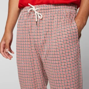 Fashion Dallas Houndstooth Track Pant- Poinciana View All