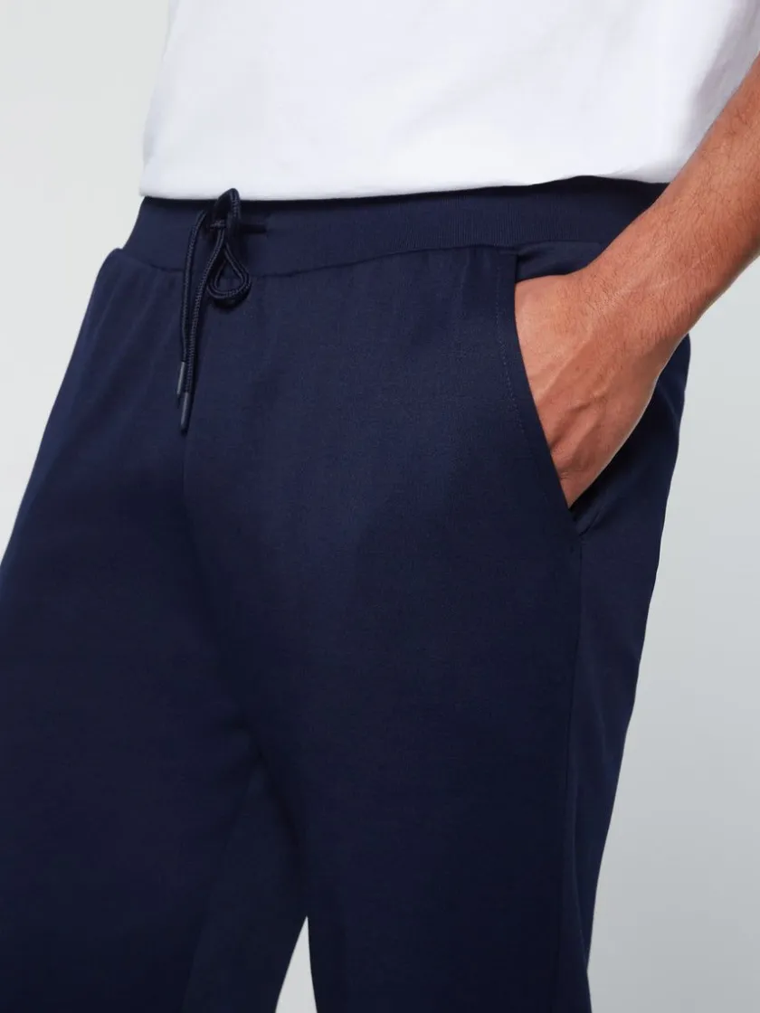 dallas_track_pant_archivio_maritime_blue_white_4.webp Shop Dallas Track Pant Archivio- Maritime Blue/ White View All