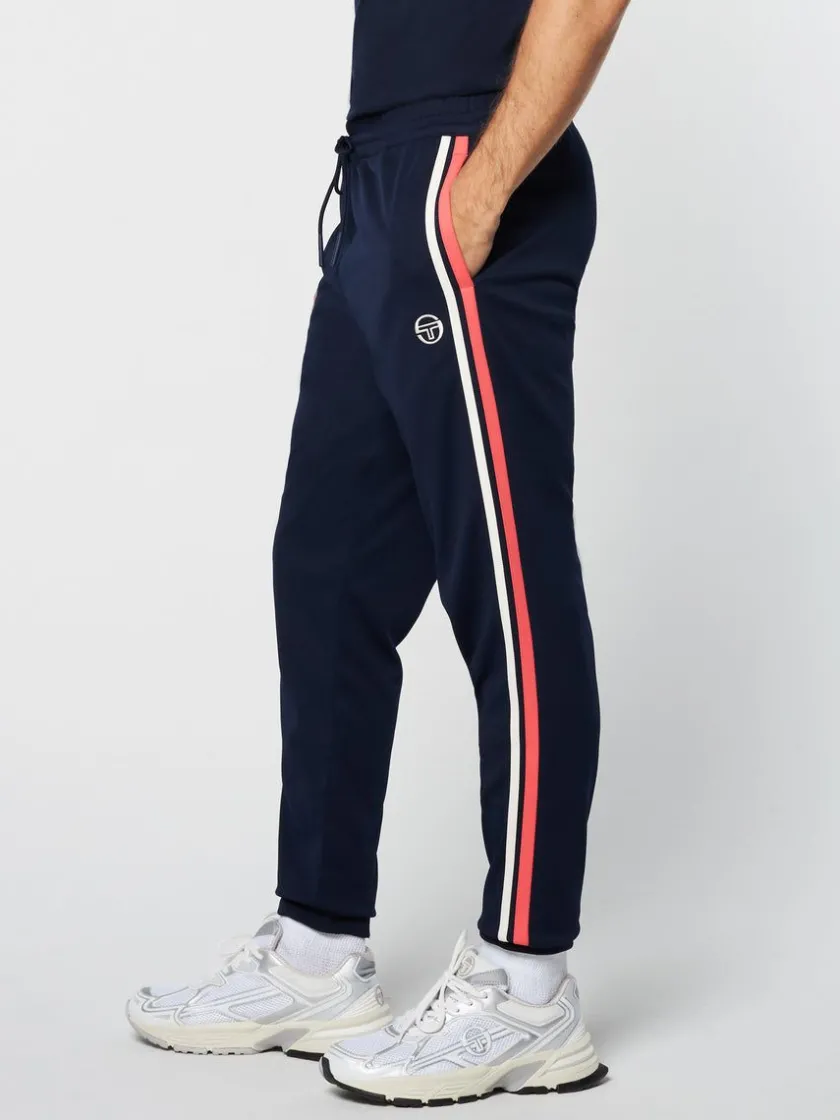 damarindo_track_pant_archivio_gardenia_maritime_blue_1-1.webp Shop Damarindo Track Pant Archivio- Gardenia/ Maritime Blue Pants And Sweatpants