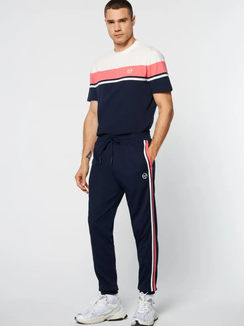 damarindo_track_pant_archivio_gardenia_maritime_blue_2-1.webp Shop Damarindo Track Pant Archivio- Gardenia/ Maritime Blue Pants And Sweatpants