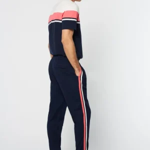 Shop Damarindo Track Pant Archivio- Gardenia/ Maritime Blue Pants And Sweatpants