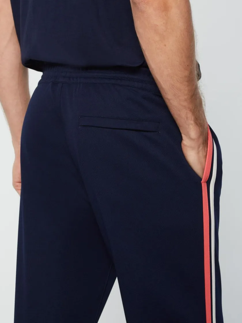 damarindo_track_pant_archivio_gardenia_maritime_blue_5-1.webp Shop Damarindo Track Pant Archivio- Gardenia/ Maritime Blue Pants And Sweatpants