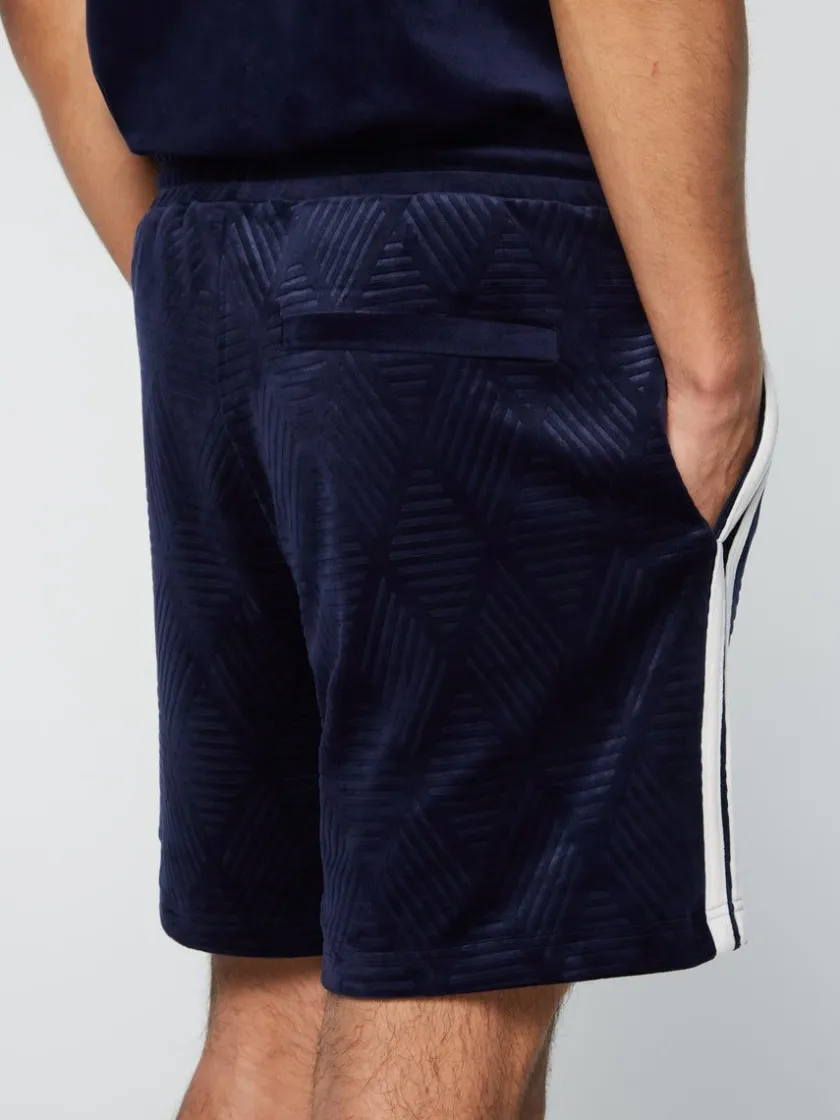 debossed_damarindo_velour_short_maritime_blue_5.webp Outlet Debossed Damarindo Velour Short- Maritime Blue View All