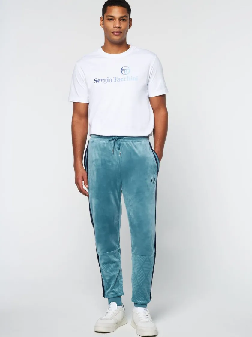 debossed_damarindo_velour_track_pant_larkspur_2.webp New Debossed Damarindo Velour Track Pant- Larkspur View All