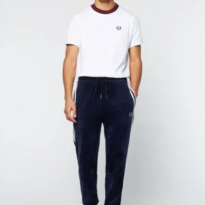 Shop Debossed Damarindo Velour Track Pant- Maritime Blue Pants And Sweatpants