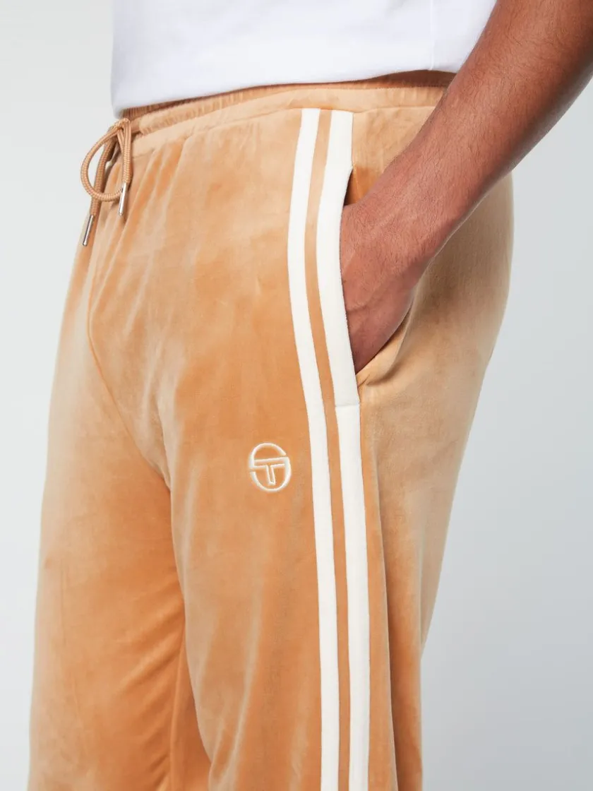 debossed_damarindo_velour_track_pant_meerkat_4.webp Sale Debossed Damarindo Velour Track Pant- Meerkat View All