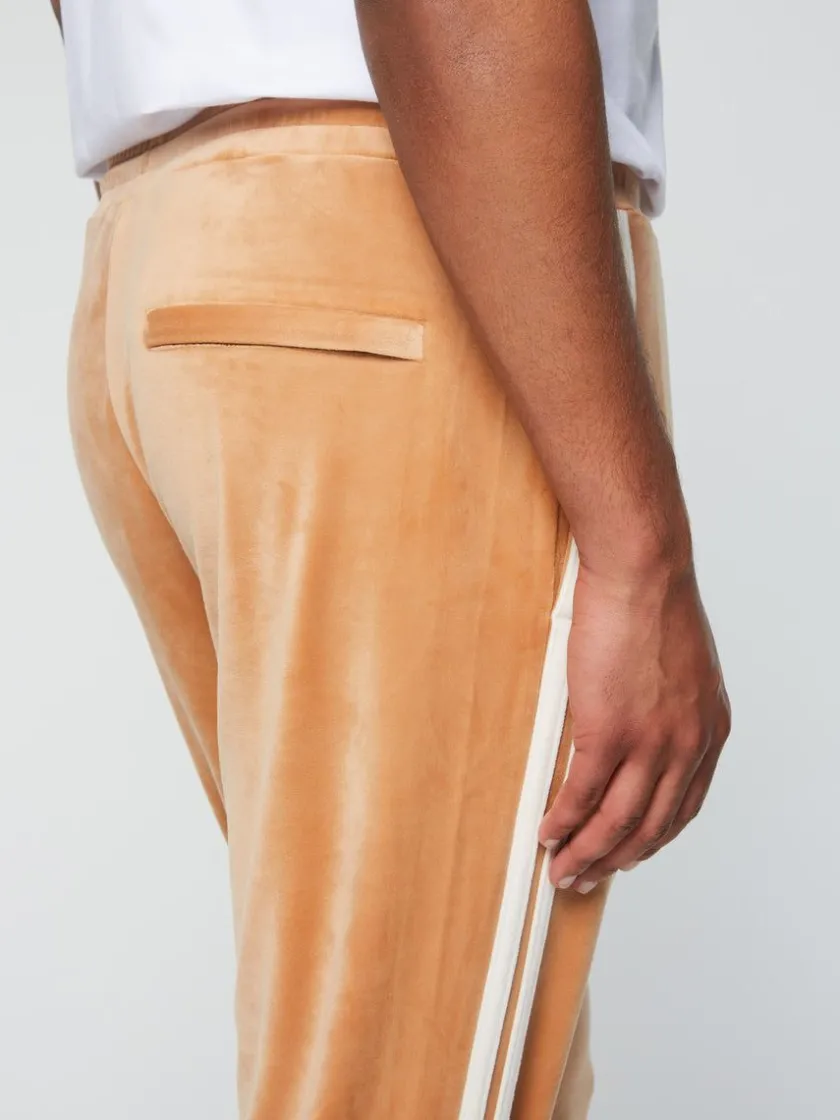 debossed_damarindo_velour_track_pant_meerkat_6.webp Sale Debossed Damarindo Velour Track Pant- Meerkat View All