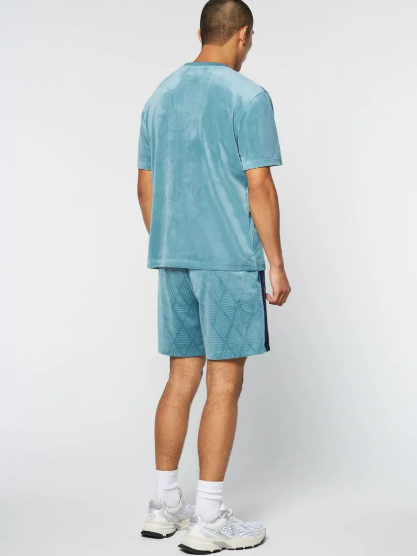 debossed_damarindo_velour_tshirt_larkspur_3-1.webp Shop Debossed Damarindo Velour T-Shirt- Larkspur Matching Separates