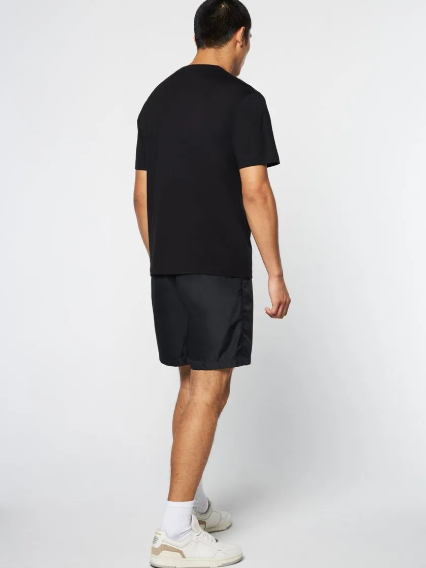 palma_tshirt_black_beauty_3-1.webp Shop Palma T-Shirt- Black Beauty Matching Separates